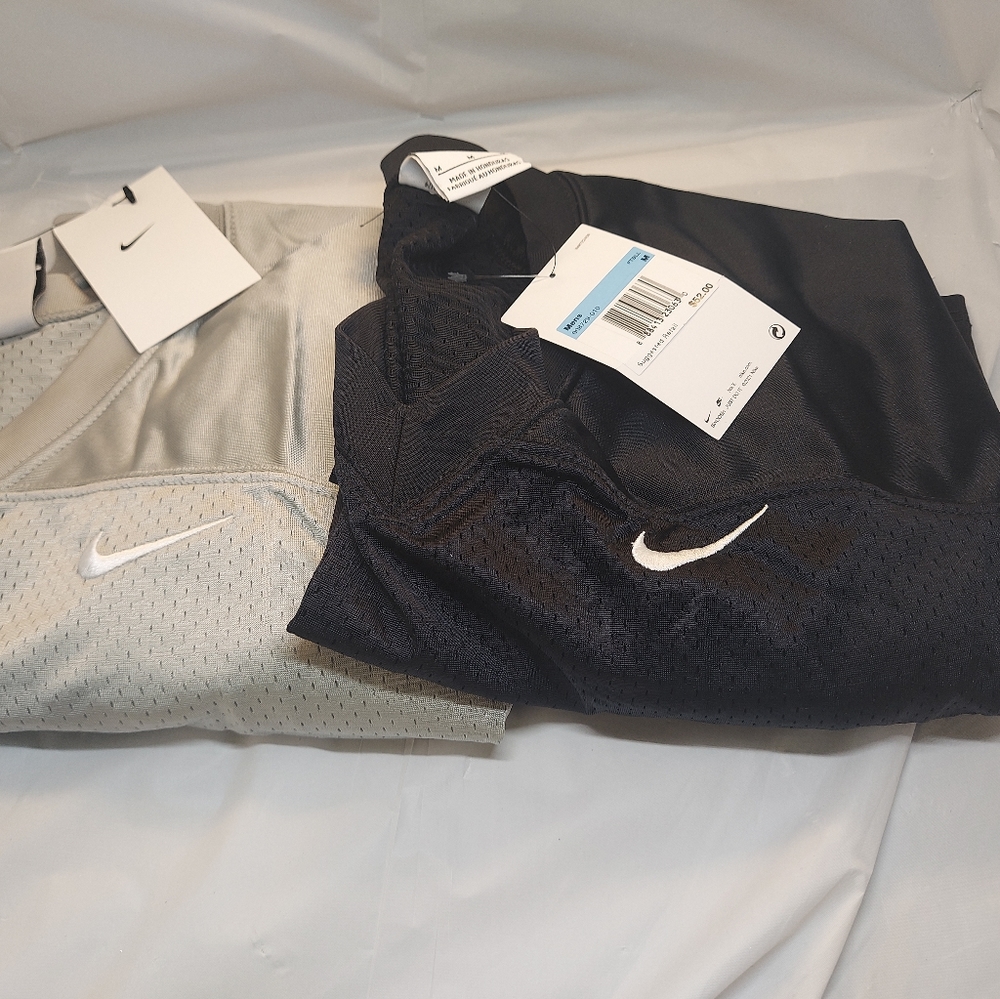 2 men's large Nike  football practice jerseys brand new